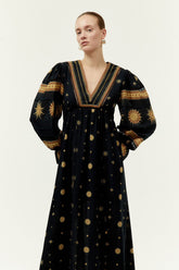 Long dress with V-neck and puff sleeves ($ 1,299.00)
